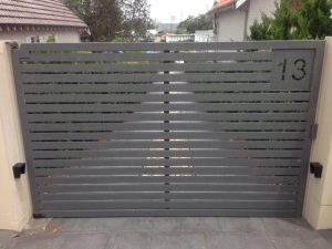 automatic gates slat design with house number manufactured into gate